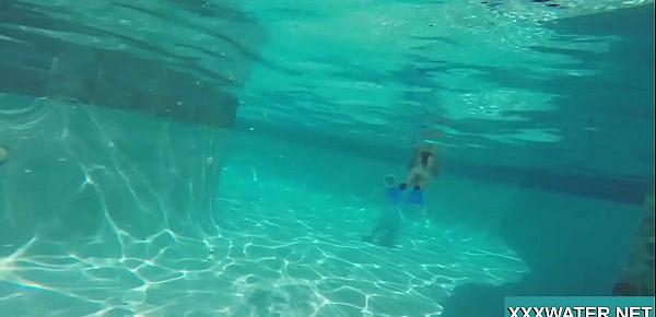  Hot brunette slut Candy swims underwater